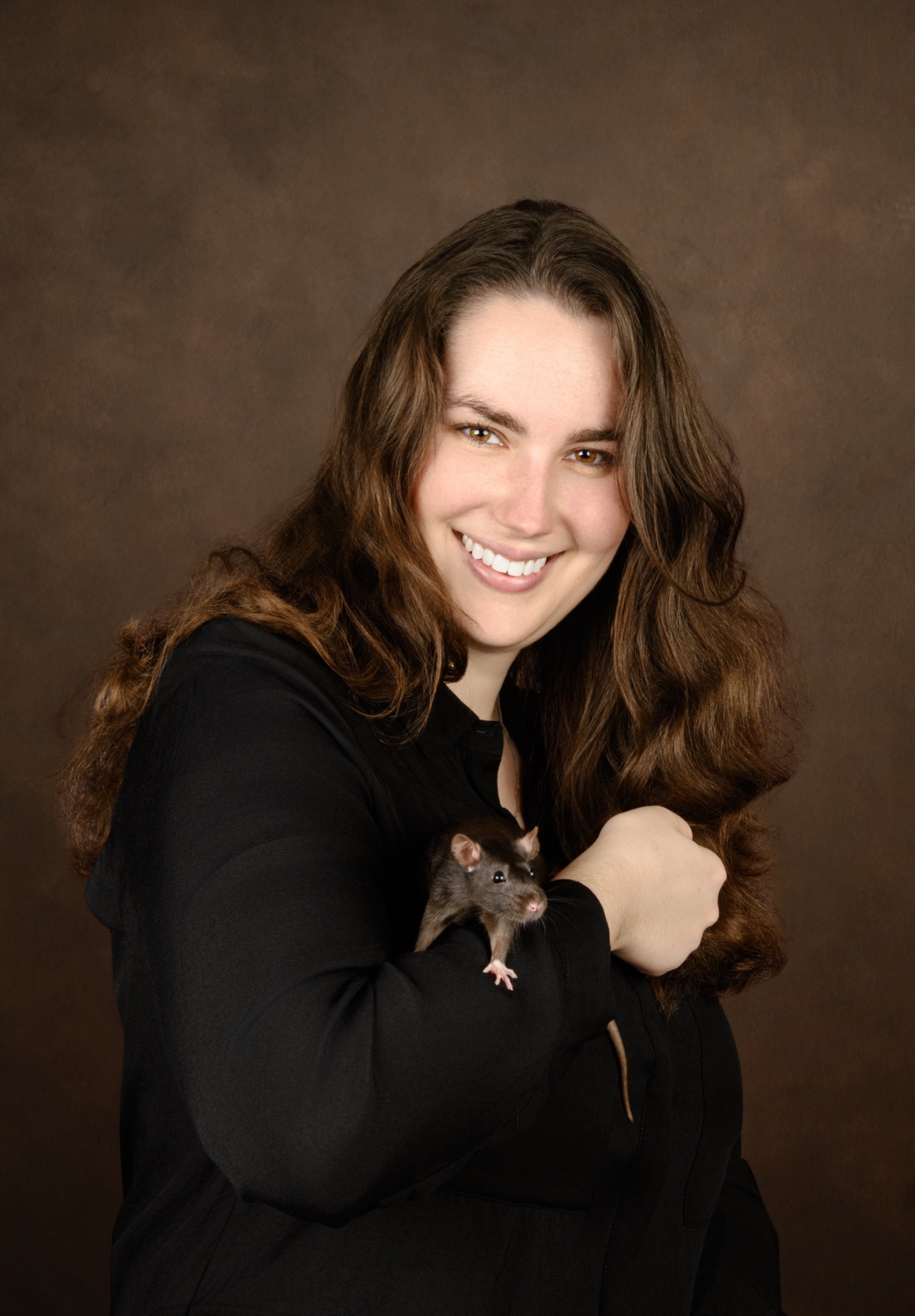 Bianca Pole holding a fancy rat